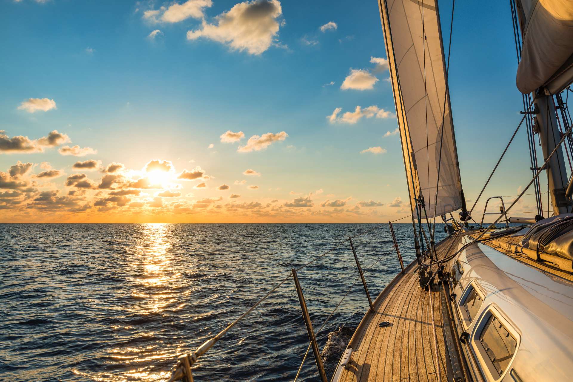 Cruising,Sailboat,Sailing,In,The,Mediterranean,Sea,At,Sunset